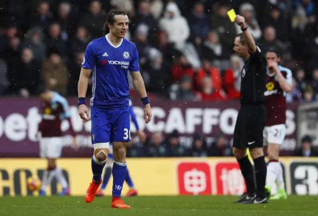 David Luiz is shown a yellow card