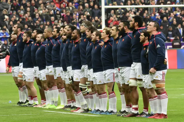 The French team sings the national anthem