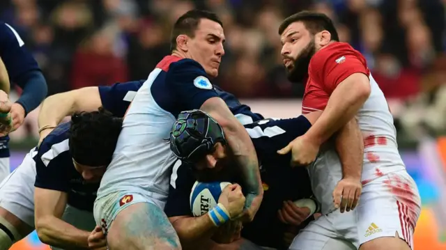 Louis Picamoles tackles Josh Strauss