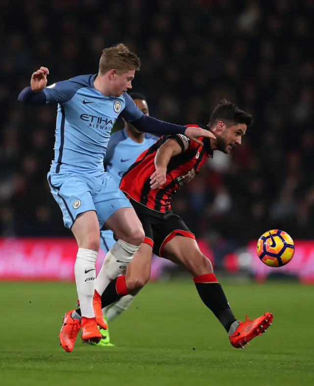 Bournemouth"s Andrew Surman and Manchester City"s Kevin De Bruyne battle for the ball