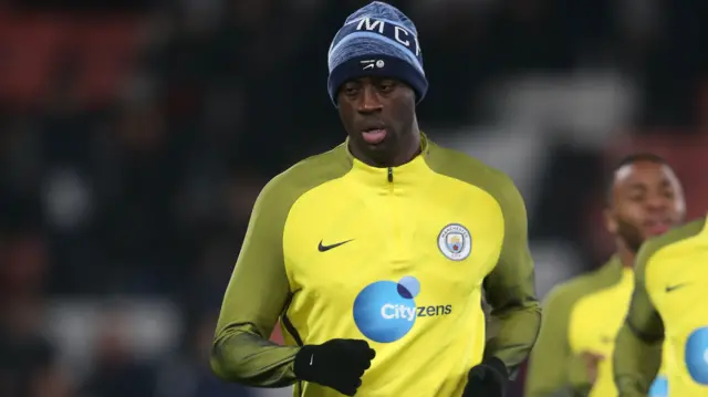 Yaya Toure warms up