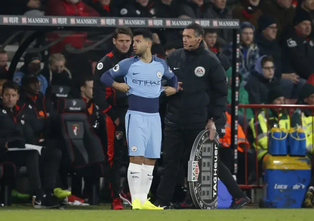 Aguero prepares to come on