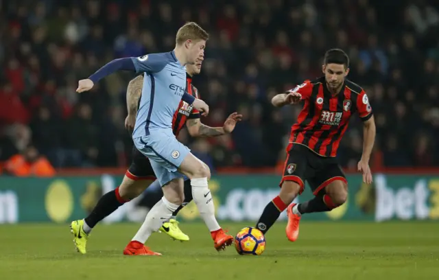 Manchester City"s Kevin De Bruyne in action with Bournemouth"s Andrew Surman