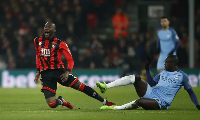 Bournemouth"s Benik Afobe is fouled by Manchester City"s Yaya Toure