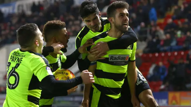 Huddersfield's Tommy Smith celebrates