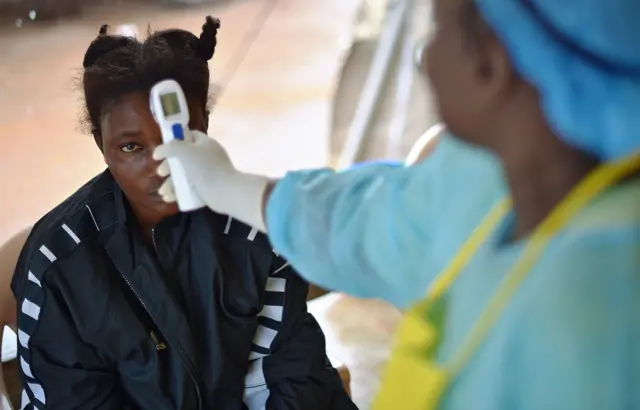 Woman being monitored for Ebola