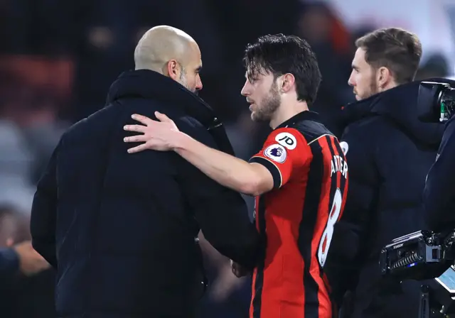 Pep Guardiola and Harry Arter