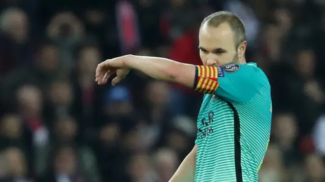 Andres Iniesta looks dejected