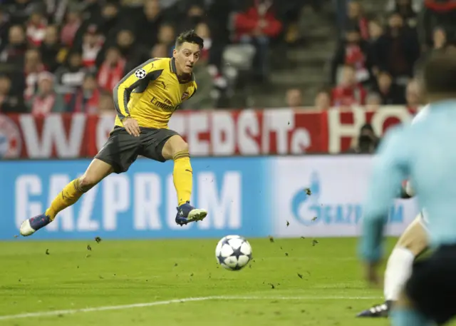 Mesut Ozil shoots on goal