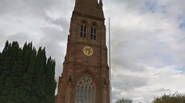 Hallow Church tower with clock