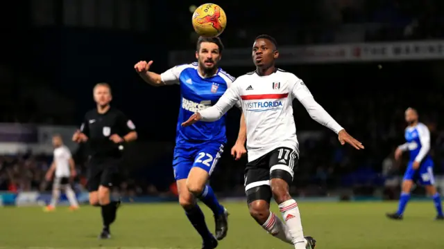 Cole Skuse (left) and Fulham's Floyd Ayite