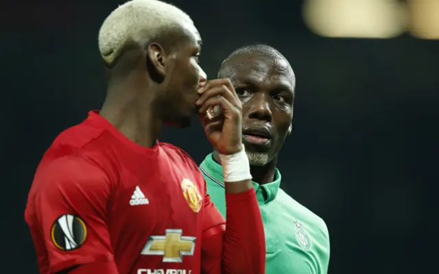 The Pogba brothers chat at half-time