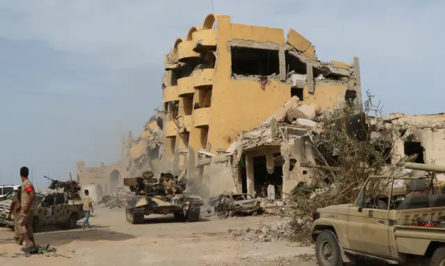 
          Members of the forces loyal to Libya's UN-backed Government of National Accord (GNA) gather in  Sirte October 14, 2016.
        