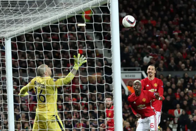 Paul Pogba hits the bar with a header