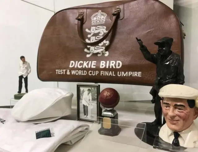 Exhibition display with umpire bag and cap