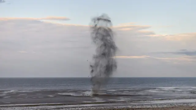 The explosion of the bombs at Holme beach