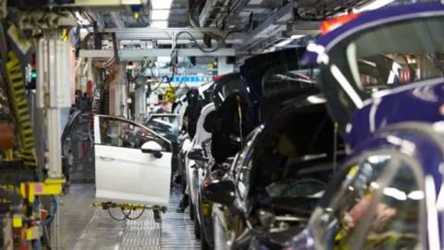 Vauxhall cars on the assembly line.