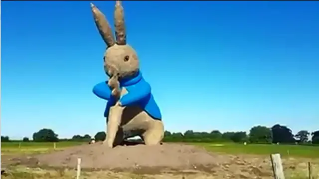 The Peter Rabbit sculpture before the fire