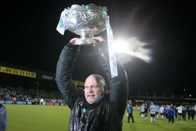 Ballymena United boss David Jeffrey parades the League Cup at Seaview after the victory over Carrick