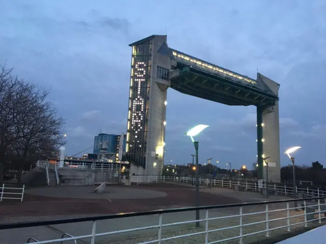 Tidal surge barrier with words on the side