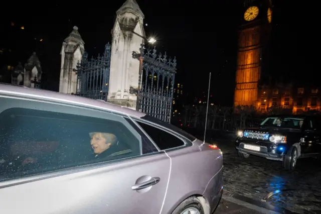 Prime Minister Theresa May leaves by car following the vote on European Union Bill