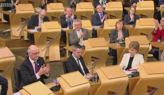 Government applaud as the budget is passed