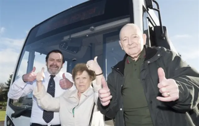 Brian and Rita Nichollas (the first passengers on the bus) with Neil Atkinson, bus driver