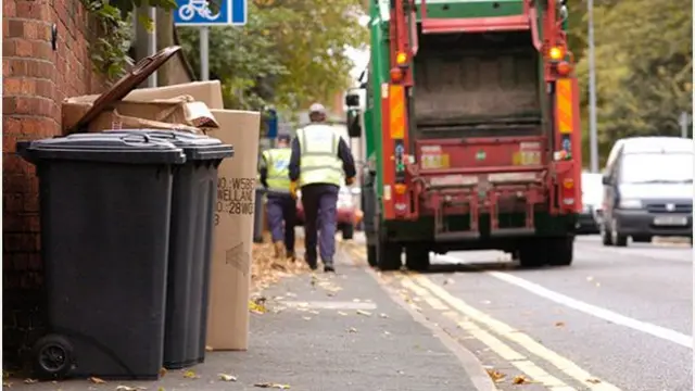 Bins next to a road