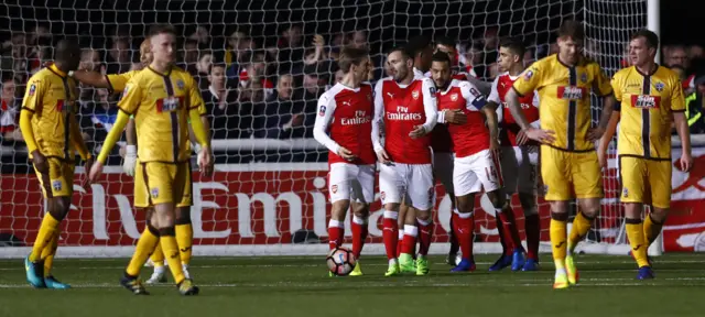 Theo Walcott celebrates scoring