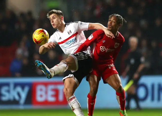 Tom Cairney (left)