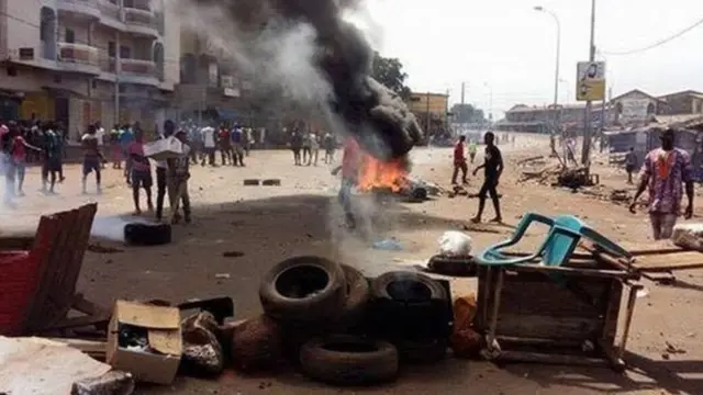 Protesters burning tires during a demonstration in Guinea