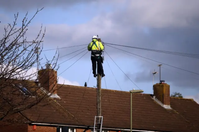 A BT Openreach engineer working on telephone line