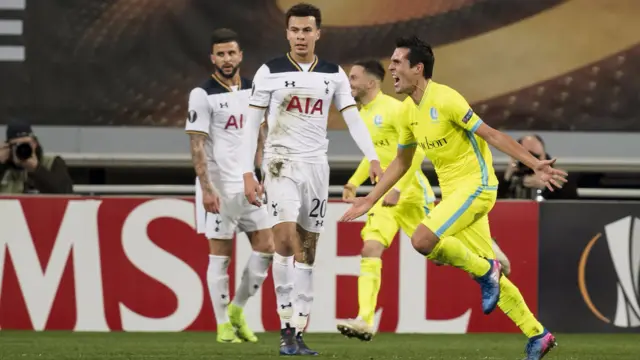 
          Gent celebrate as Dele Alli (centre) and Kyle Walker (left) look on
        