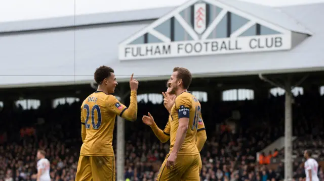 Tottenham players celebrate at Fulham