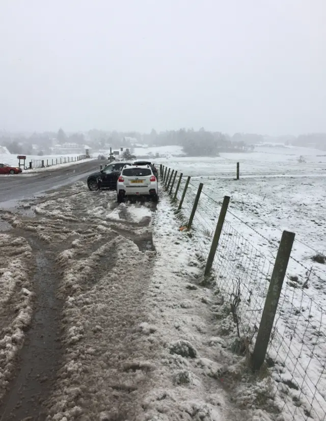 Cars struggle to stay on the road at Kilmacolm in Renfrewshire