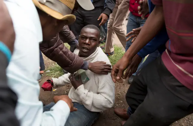 Man holds SA ID