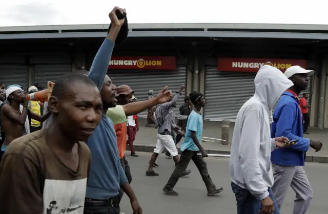 
          Anti-immigrant protesters have been marching through Pretoria
        