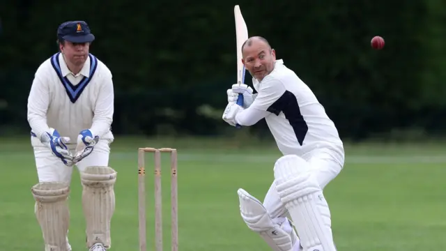 Eddie Jones playing cricket