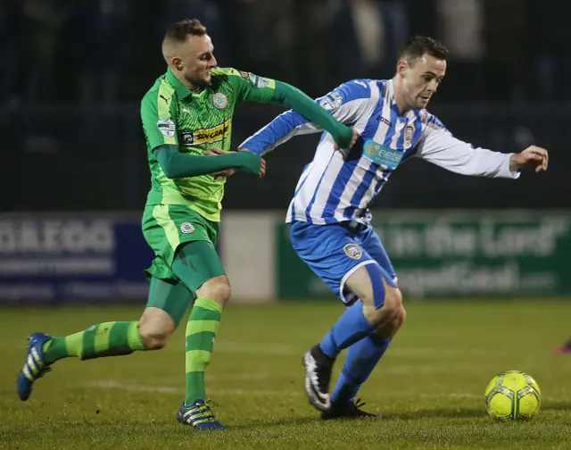 
          Coleraine's Darren McCauley and Cliftonville's Jude Winchester
        