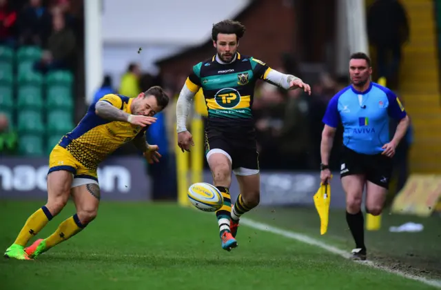 
          Ben Foden of Northampton Saints is tackled by Francois Hougaard
        