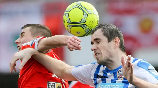 Action from Cliftonville against Coleraine