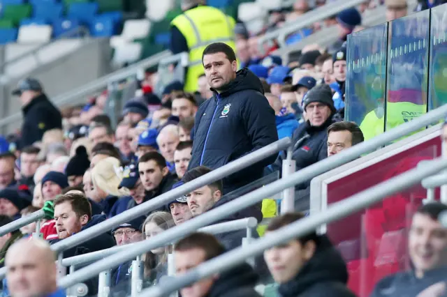 Linfield manager David Healy watches on from the stand