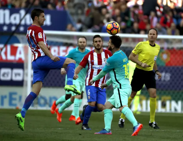 Lionel Messi and Koke