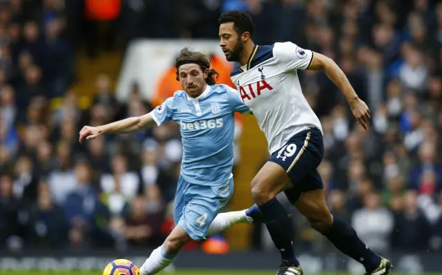 Joe Allen challenges Mousa Dembele