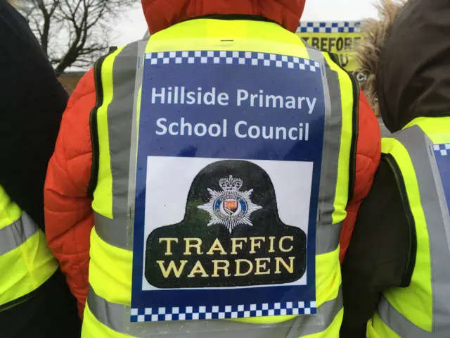 Rear view of child's traffic warden jacket