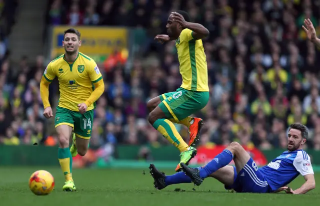 
          City's Cameron Jerome and Town's Cole Skuse battle for the ball
        