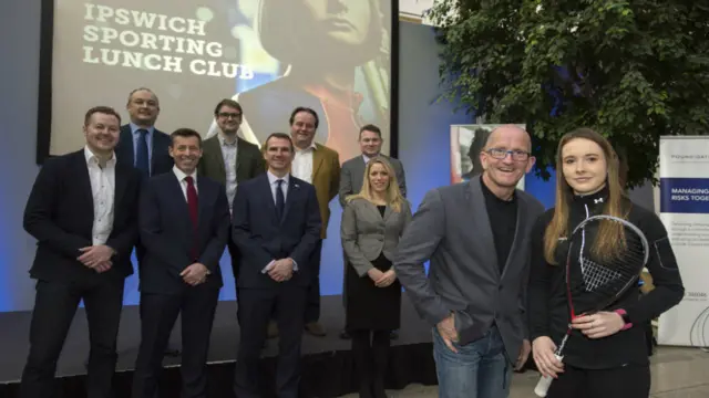 
          Eddie Edwards and Lucy Turmel pose with business leaders from Ipswich Sporting Lunch Club
        