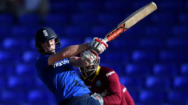 
          Chris Woakes of England bats during the tour match between WICB President's XI and England at Warner Park on 27 February
        