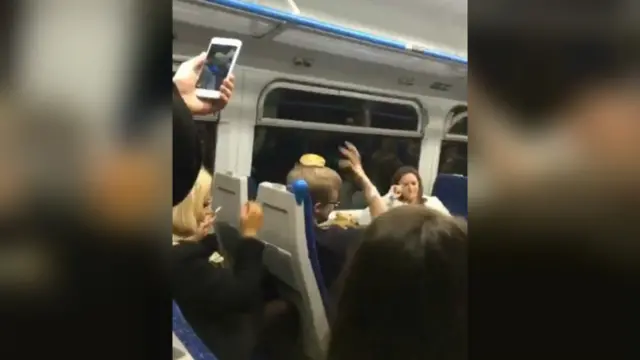 Man with bagel on his head