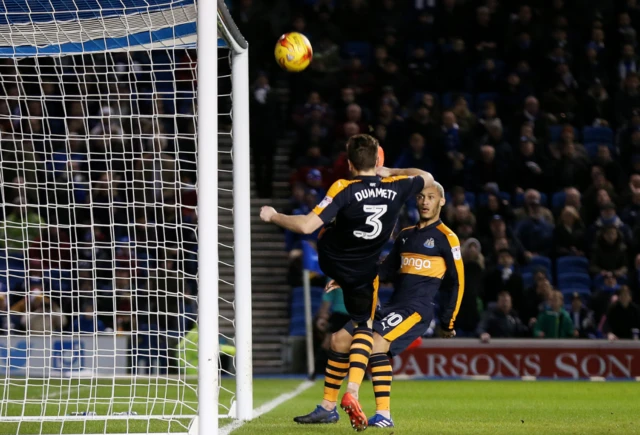 Paul Dummett clears